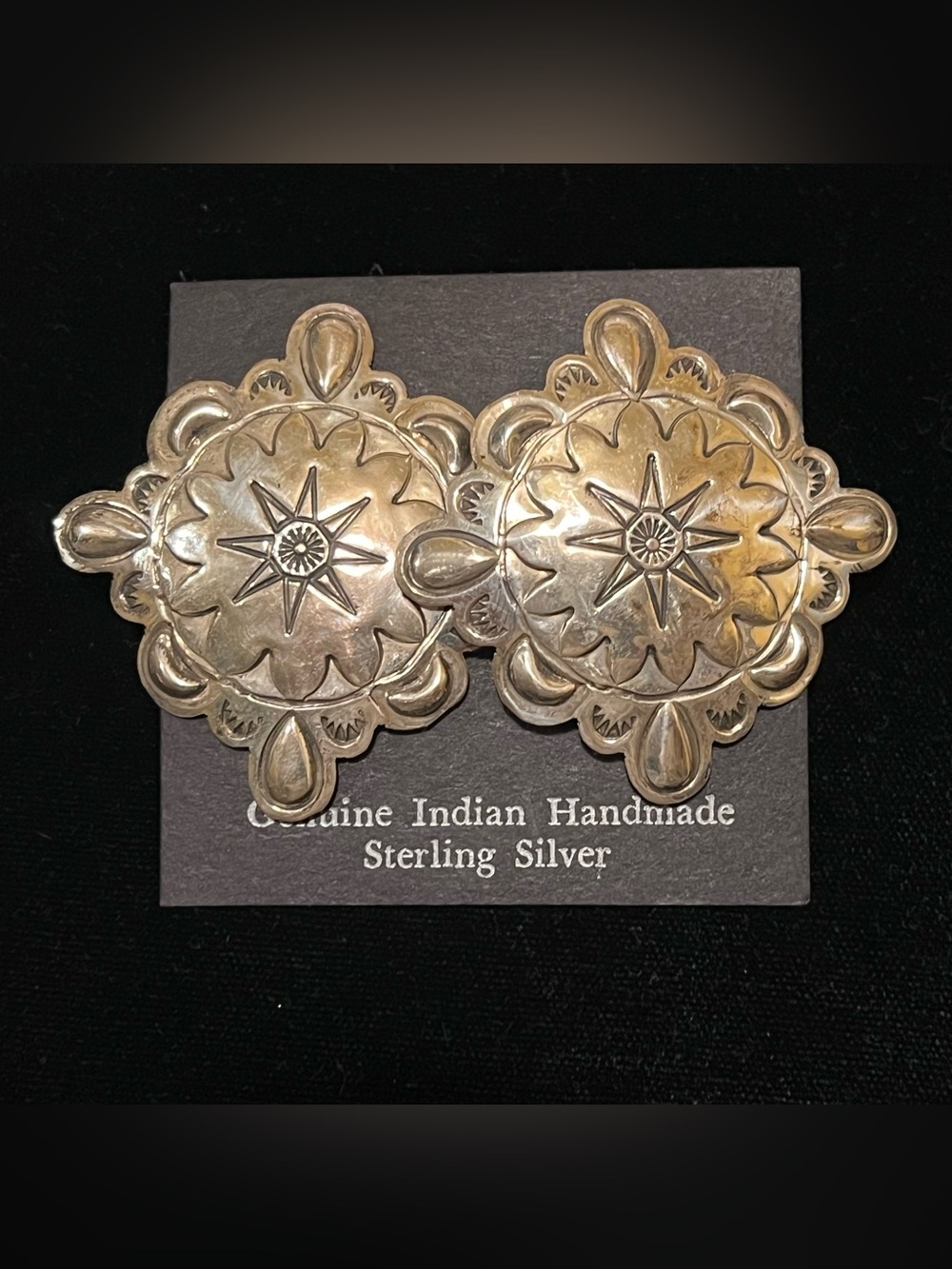 WOMEN’S STERLING SILVER L. BLACKGOAT CONCHO CLIP ON EARRINGS.